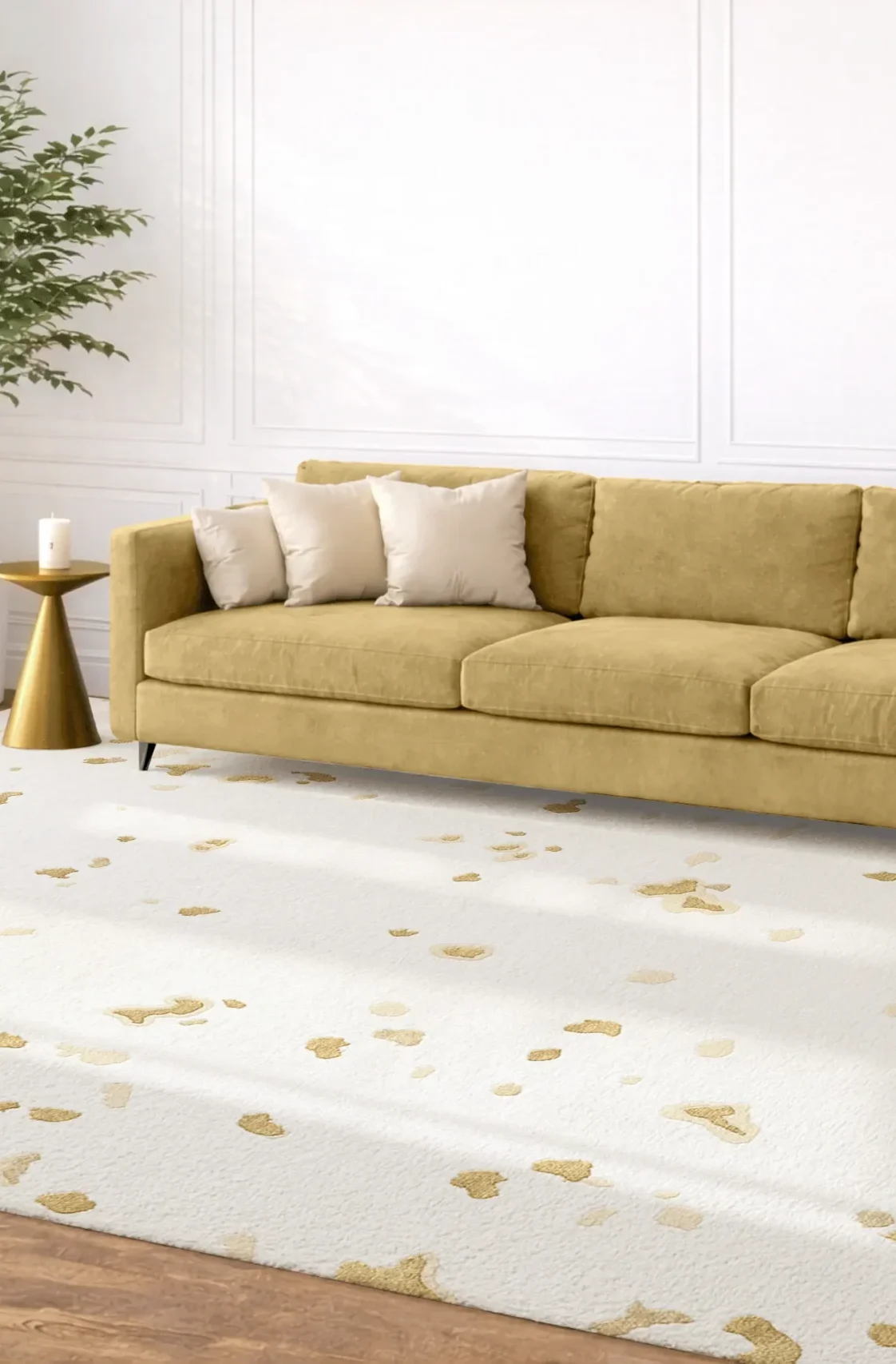 Luxury hand-knotted rug in ivory with scattered gold fleck pattern inspired by mineral fragments, styled in a contemporary interior with upholstered sofa and brass accents, showcasing Northwest 35 craftsmanship.​